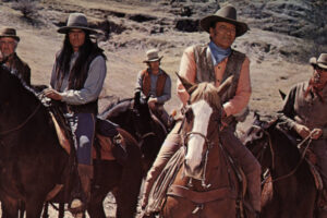 gunsmoke-director-andrew-mclaglen-went-on-make-westerns-john-wayne-585x390-1.jpg