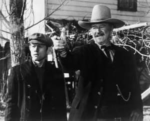 John-Wayne-in-one-of-his-last-movies-The-Shootist-alongside-Ron-Howard-1024x821.png