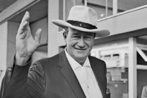 john-wayne-once-embarrassed-himself-protect-elderly-mentor-585x390-1.jpg